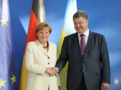 П.Порошенко и А.Меркель договорились о встрече глав МИД стран нормандской четверки (дополнено)