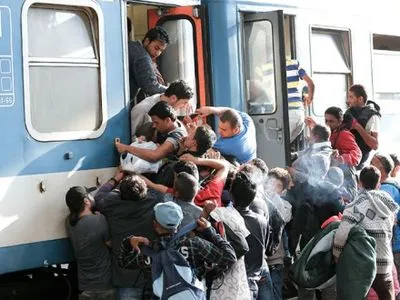 ФРГ не несет ответственности за поток мигрантов в Европе - Туск