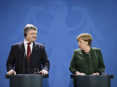 П.Порошенко начал переговоры с А.Меркель