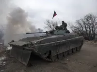Бойовики стріляли з бронетехніки у районі Докучаєвська