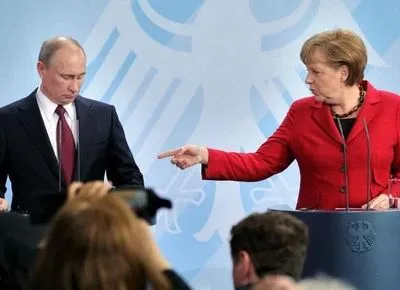 Путин встретился с Меркель: начали говорить об Украине