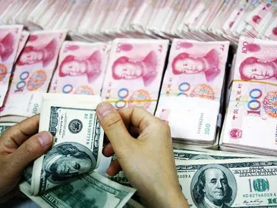 Народный банк Китая снизил курс юаня к доллару до минимума с 2008 года