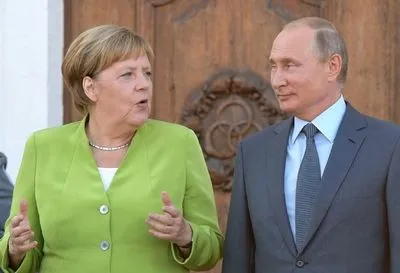Разведение на Донбассе, нормандская четверка и газ: о чем Путин говорил с Меркель