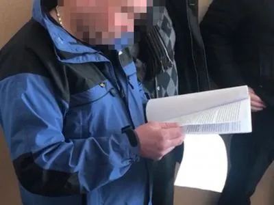 В Киеве полицейского подозревают в вымогательстве 28 тыс. долларов взятки