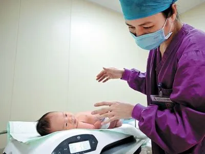 Китай отменил штрафы за рождение трех детей в одной семье
