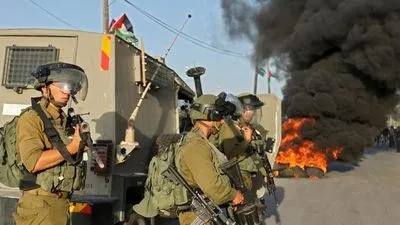 Израильские силы убили двух палестинских боевиков. Двое подростков погибли в столкновениях