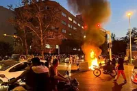 Боевики на мотоциклах убили девять человек во время протестов в Иране