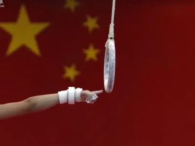 В Китае погибла гимнастка: партнер не успел поймать женщину