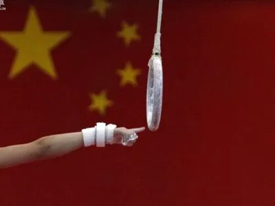 У Китаї загинула гімнастка: партнер не встиг зловити жінку 