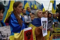 Українці влаштували протест у Лісабоні на тлі приїзду президента Бразилії