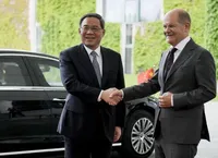 Канцлер Германии Олаф Шольц встретился с премьером КНР Ли Цяном