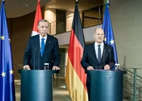 In Berlin, Erdogan links German support of Israel in Gaza to Holocaust guilt
