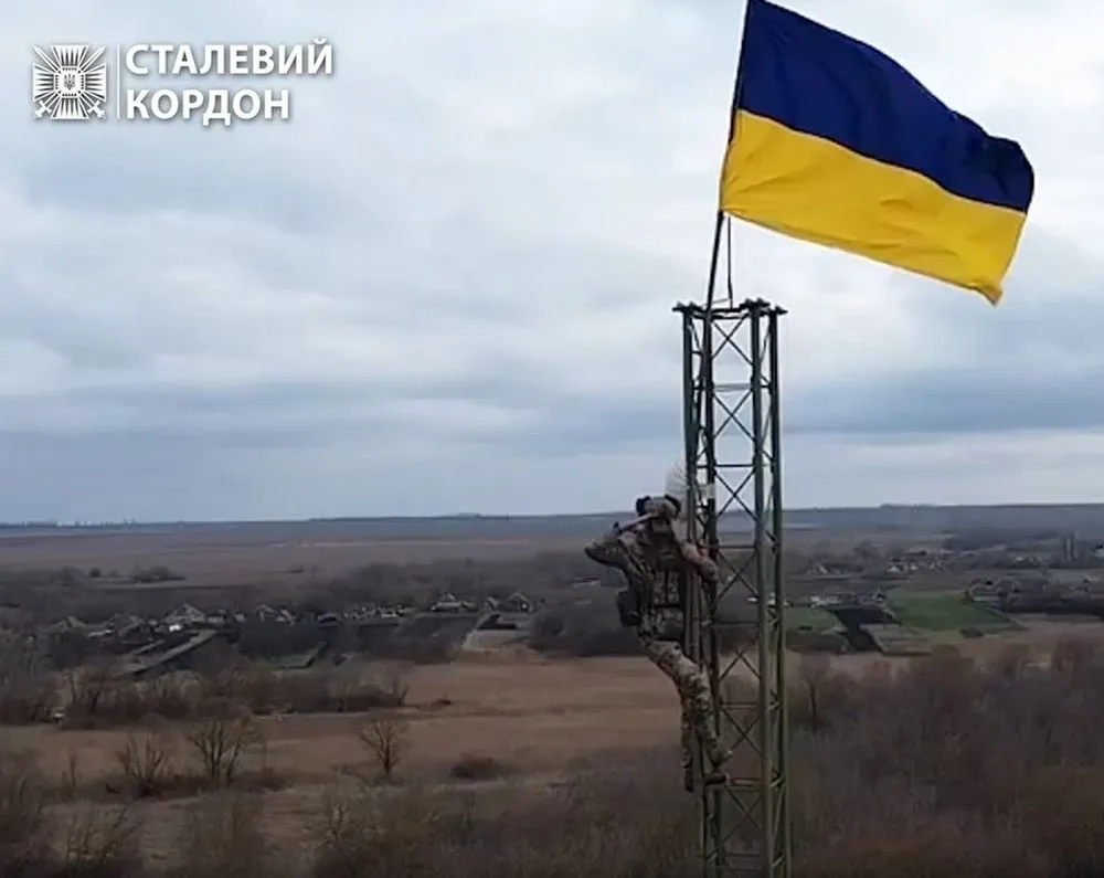 Ukrainian border guards raised the national flag at the Budarky checkpoint on the border with russia
