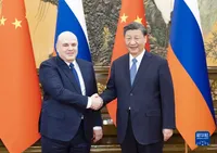 China's leader declares his desire to strengthen ties with Russia 