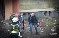 Rescuers take five people out of destroyed houses in Lviv