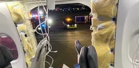 In the US, an airline has completely suspended Boeing 737 flights after the plane's emergency exit door broke off during the flight