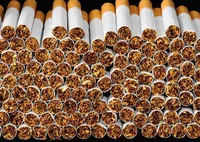 More prominent warnings about the dangers of smoking will be introduced on cigarette packages from today