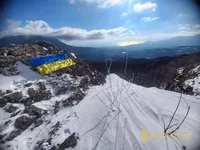 Activists unfurl Ukrainian flag on a mountain peak in occupied Crimea