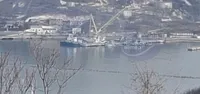 In Sevastopol, the occupiers brought a floating crane to lift the sunken guard ship "Tarantula"