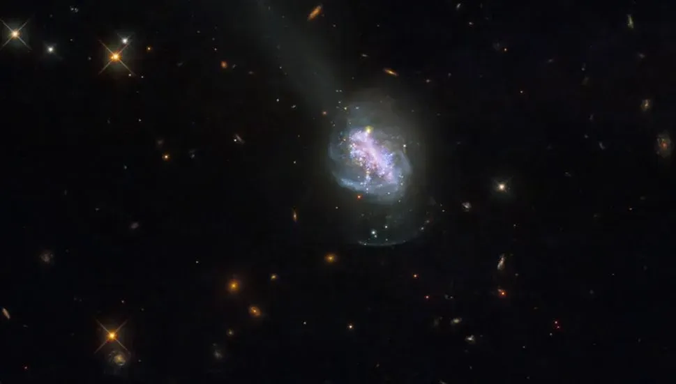 hubble-telescope-reveals-blue-galaxy-with-active-star-formation