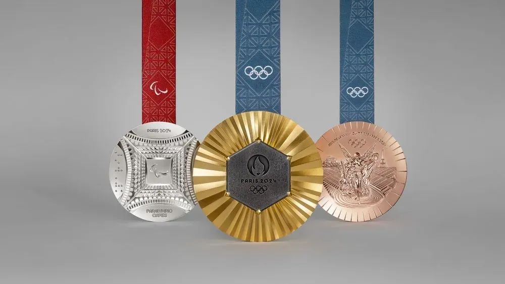 with-fragments-of-the-eiffel-tower-ioc-presents-unique-medals-for-the-2024-olympics