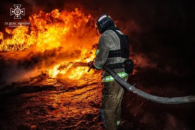 In Kharkiv region, rescuers extinguish a fire at an oil depot caused by russian shelling on February 9