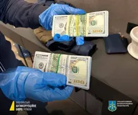 Receiving USD 55 thousand bribe: tax official from Kharkiv region is served a notice of suspicion