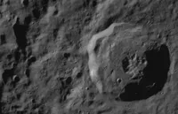 Odyssey spacecraft prepares to land on the Moon, near the crater Malapert A