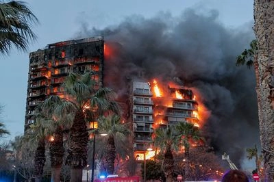 In Spain, a 14-storey residential building with more than 130 apartments burned to the ground
