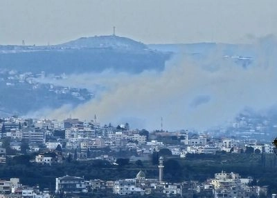 Dozens of missiles fired from Lebanon at Israel, Israeli air force retaliates