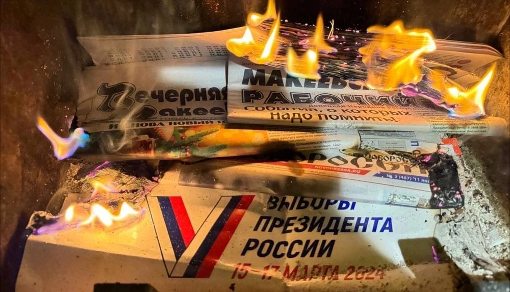 В Макеевке партизаны уничтожили российские агитки, призывавшие жителей оккупированной Донетчины идти на выборы президента рф