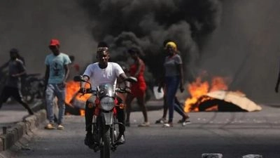 14 bodies found after attack on suburbs of Haiti's capital, where gang violence continues for third week