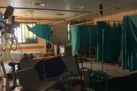Israeli forces surrounded two more hospitals in Gaza