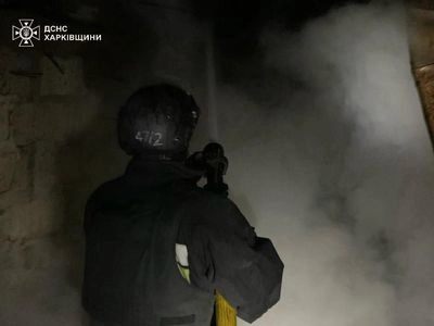 Rescuers eliminate fire caused by russian shelling in Kharkiv region