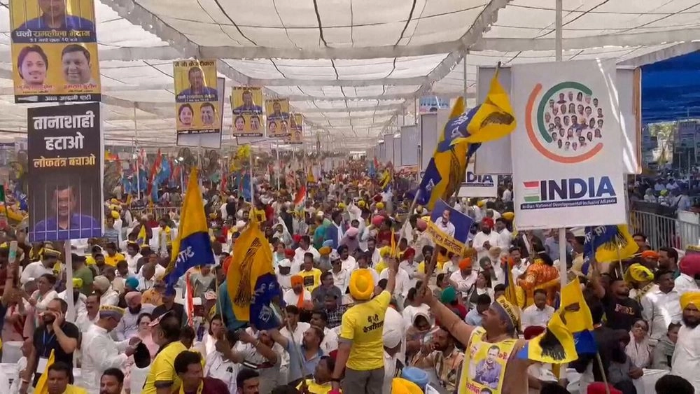 Thousands of people rally in India as opposition and Modi campaign for election begins