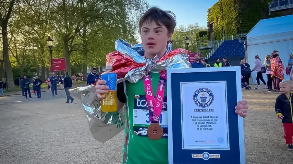 A runner with Down syndrome sets a record in the London Marathon and gets into the Guinness Book