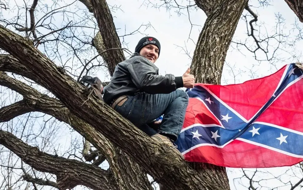 a-man-who-broke-into-the-us-capitol-with-a-confederate-battle-flag-was-sentenced-to-more-than-2-years-in-prison