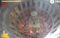 Holy Fire descends in Jerusalem, believers pass the flame around the world