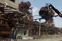 Occupants take the remains of the Avdiivka Coke Plant for scrap