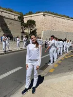 Ukrainian gymnast Maria Vysocanska carries the Olympic torch on the first day of the relay in France
