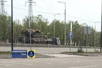 russians transport tanks by rail through occupied Mariupol