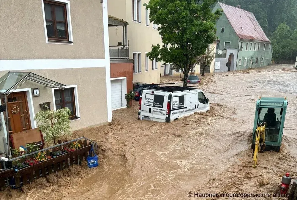 In Germany, due to heavy rains, floods occurred that washed cars into the river