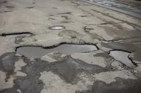A terrible section of road in the Chernihiv region, which an ambulance barely took a seriously ill elderly woman to the hospital, should be repaired by a Recovery Agency