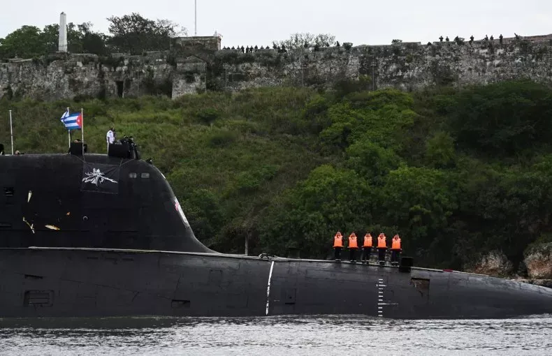 Off the coast of Cuba, a russian nuclear submarine demonstrated a damaged hull that divers were trying to repair
