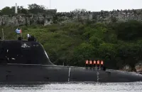 У берегов Кубы российская атомная подводная лодка демонстрировала поврежденный корпус, который пытались отремонтировать водолазы