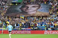 A banner with the image of fallen soldier Nazariy "Hrynka" Hryntsevych was unfurled at the Ukraine-Belgium match