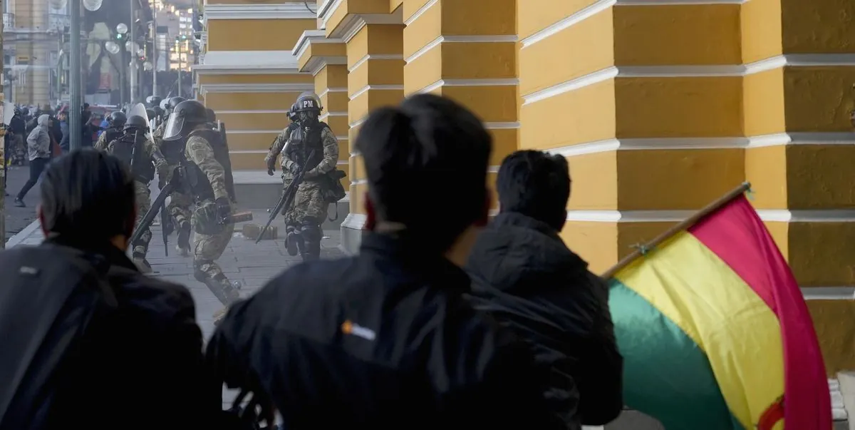 Bolivian military retreats from presidential palace after leadership change