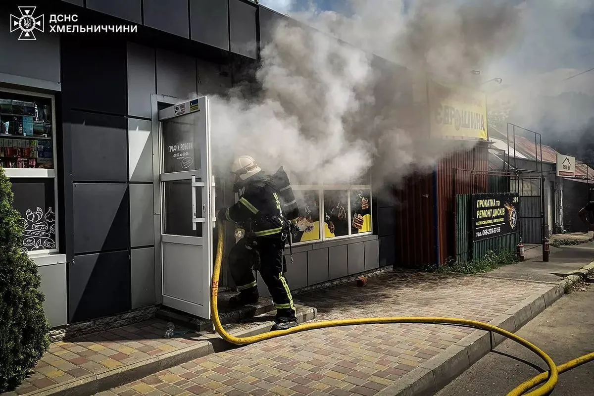 Rescuers eliminate a fire in a store in Khmelnytskyi