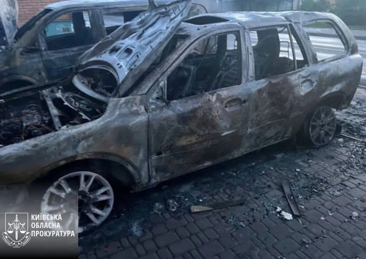 Couple detained in Kyiv region for setting fire to cars of military and volunteers