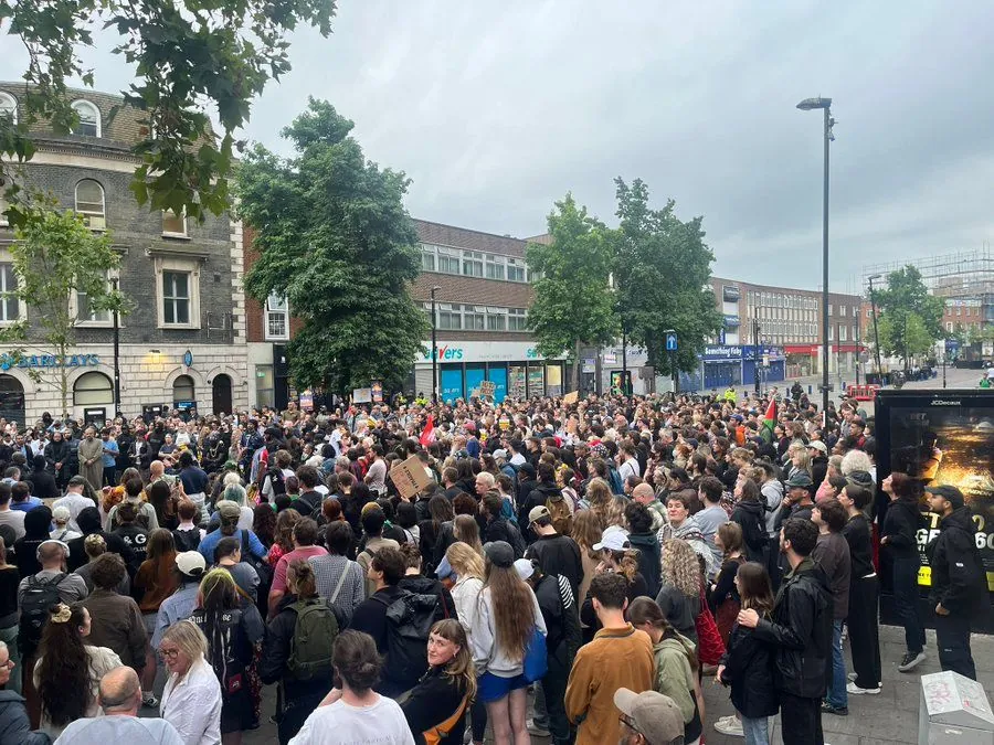 Police-protected demonstrations in Britain in response to far-right riots